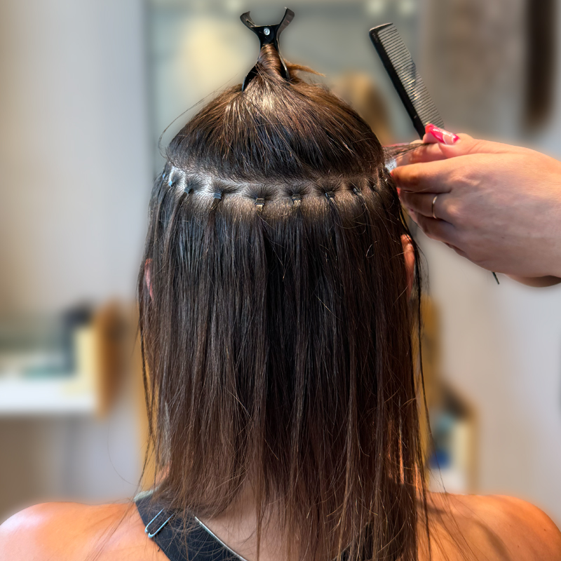 hair extension application on client