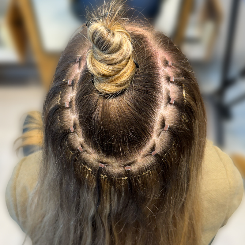 hair extension application on client