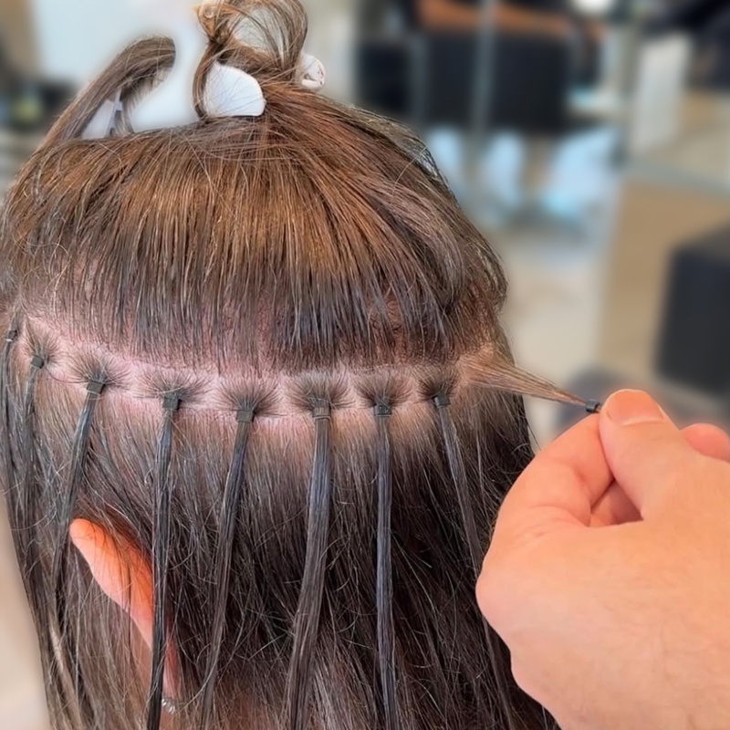 hair extension application on client