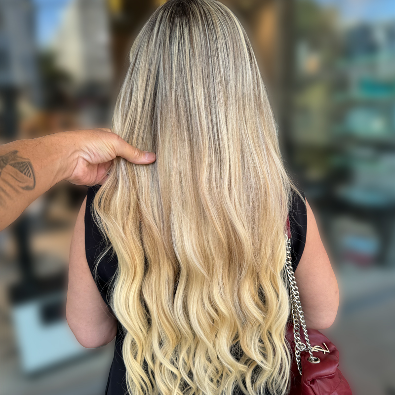 keratin tip hair extensions on client