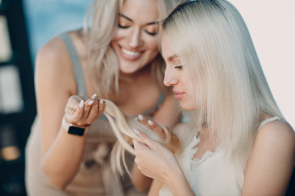 woman looking at hair extensions